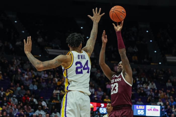 Shareef O'Neal goes up to block a shot against Texas A&M in the Pete Maravich Assembly Center, showing off his tremendous length.